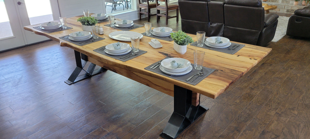 Large Elm Dining Table with geometric legs with elm beam crossing from one to the other.