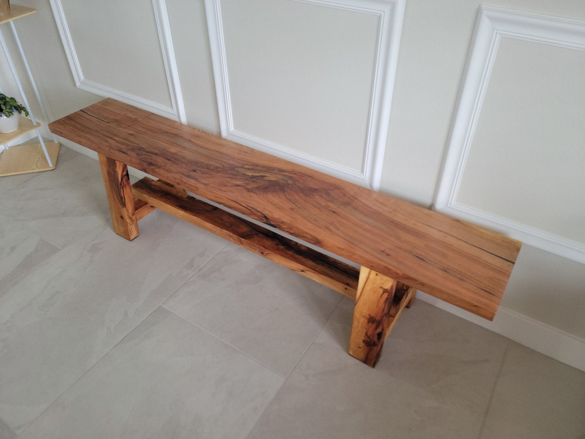 Pecan slab bench with custom Elm legs and cross beam, handcrafted wood bench with natural grain and epoxy-filled cracks