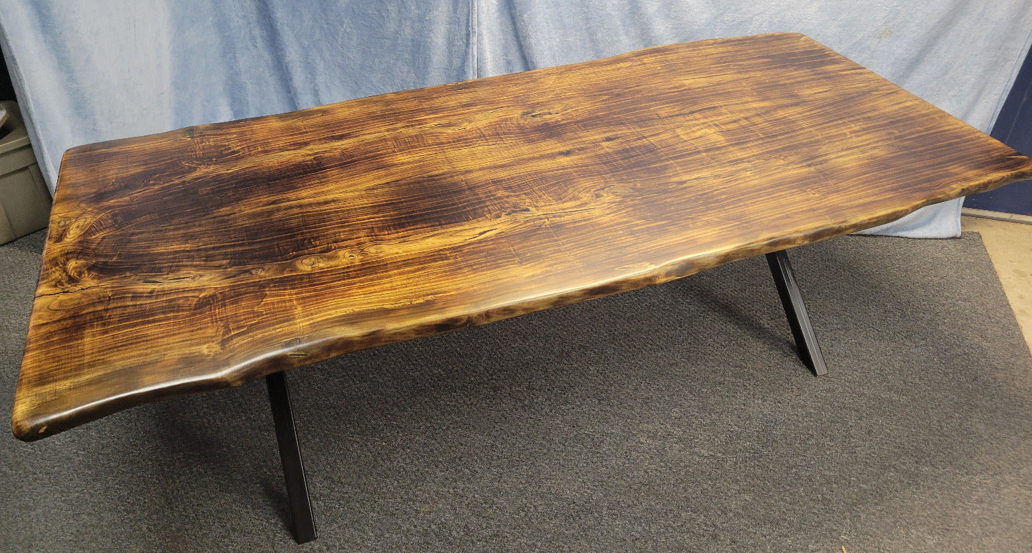 Ash dining table with Sho sugi ban burned top with black x-style metal legs