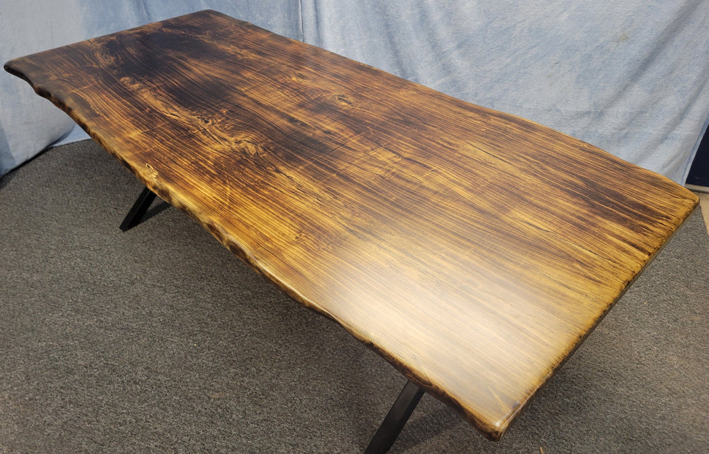 Ash dining table with Sho sugi ban burned top with black x-style metal legs