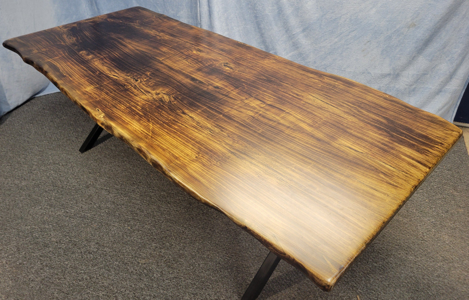 Ash dining table with Sho sugi ban burned top with black x-style metal legs
