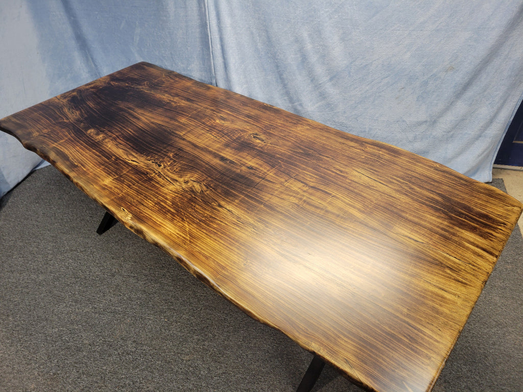 Ash dining table with Sho sugi ban burned top with black x-style metal legs