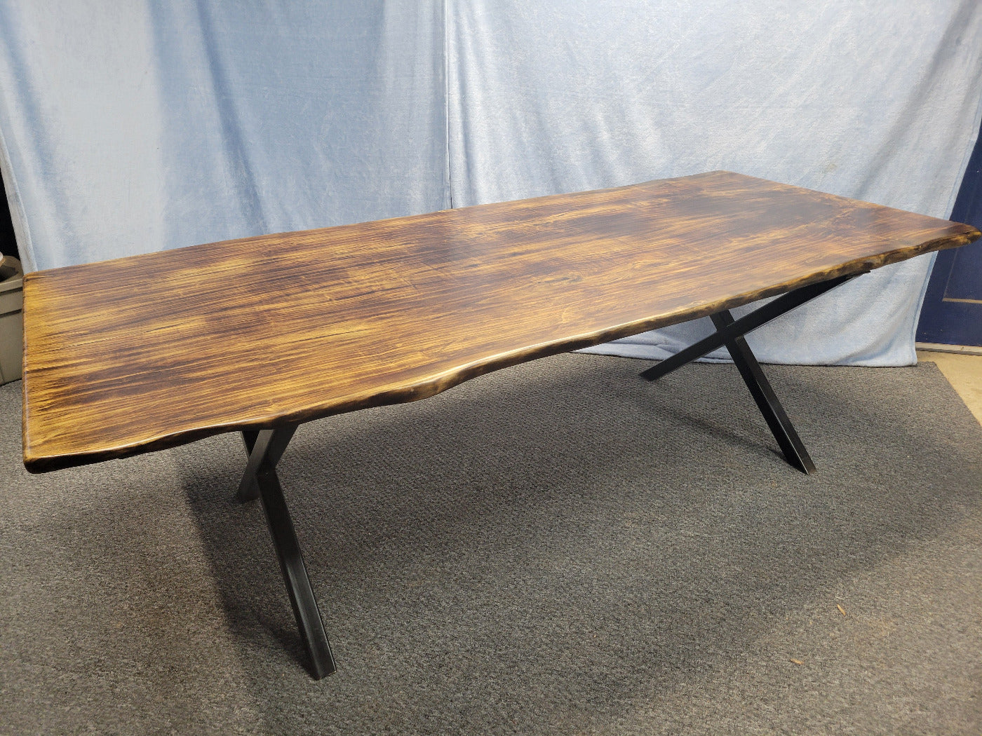 Ash dining table with Sho sugi ban burned top with black x-style metal legs