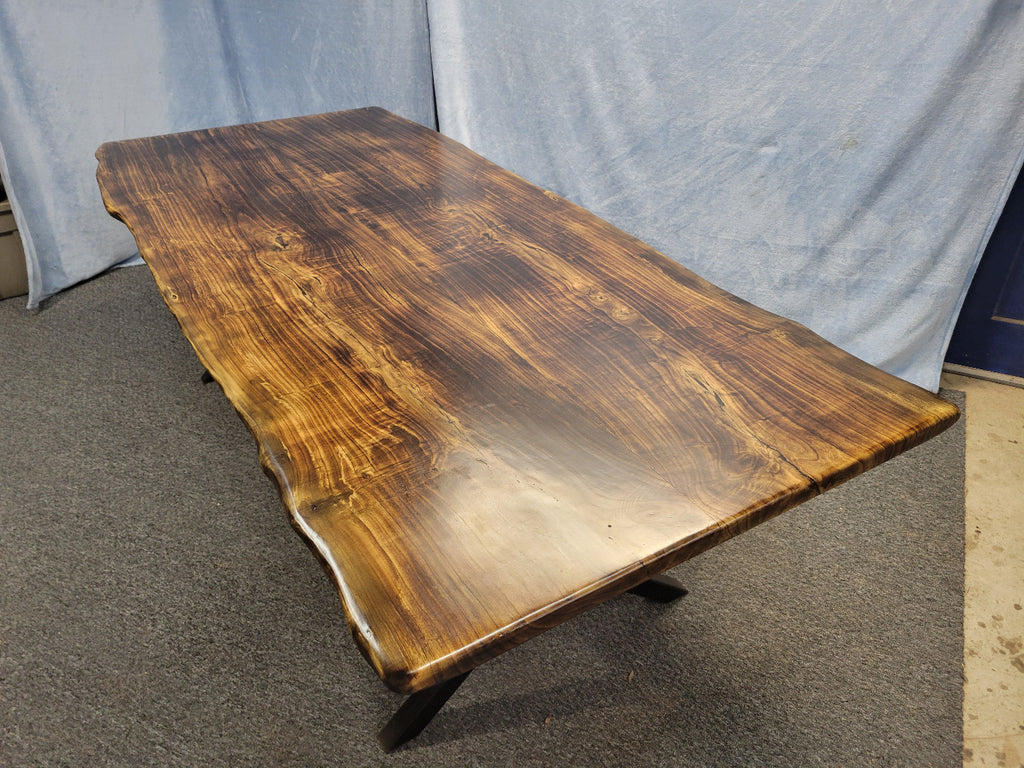 Ash dining table with Sho sugi ban burned top with black x-style metal legs