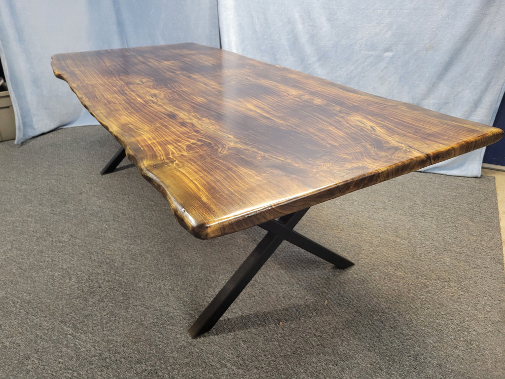 Ash dining table with Sho sugi ban burned top with black x-style metal legs