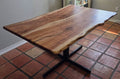 Live edge Pecan Breakfast table with black metal pedestal stand in natural color.