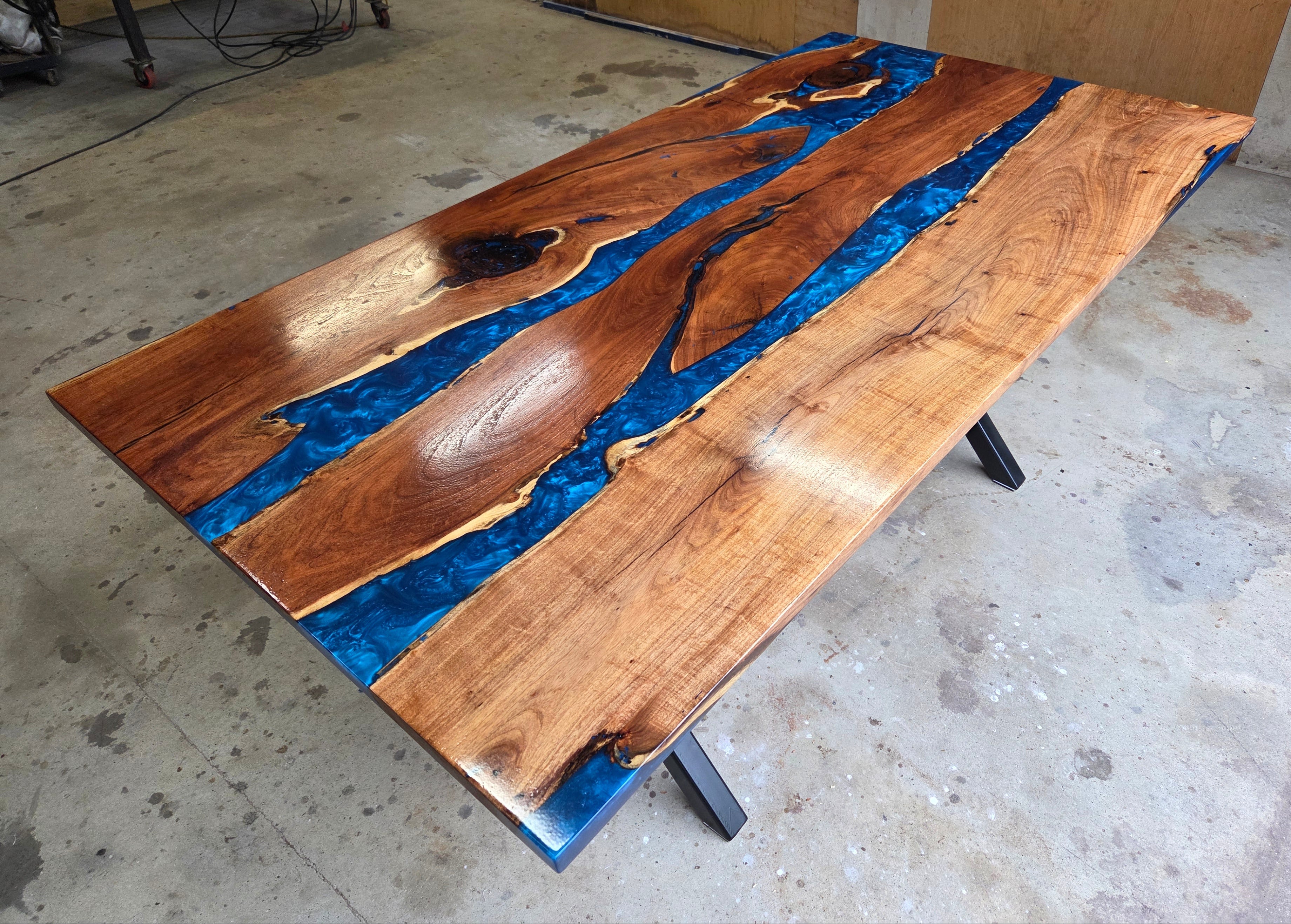 Mesquite River table with Ocean Blue Epoxy, metal X-style legs and semi-gloss finish