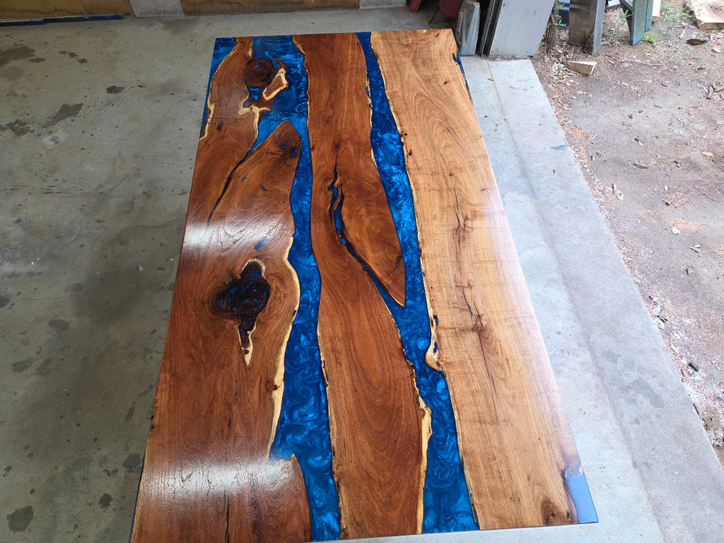 Mesquite River table with Ocean Blue Epoxy, metal X-style legs and semi-gloss finish