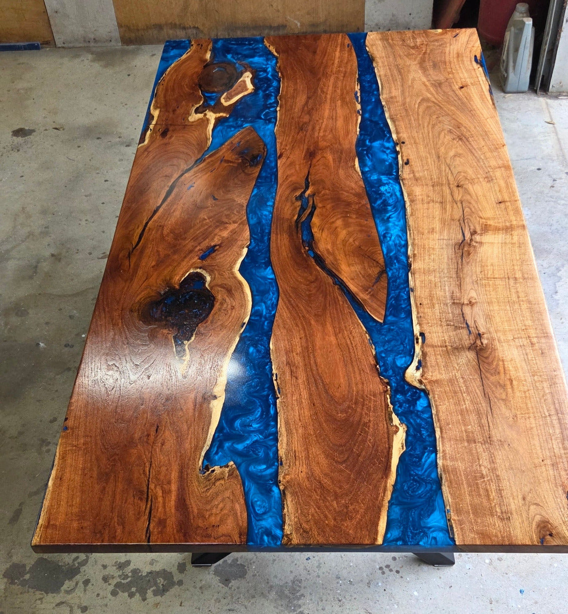 Mesquite River table with Ocean Blue Epoxy, metal X-style legs and semi-gloss finish