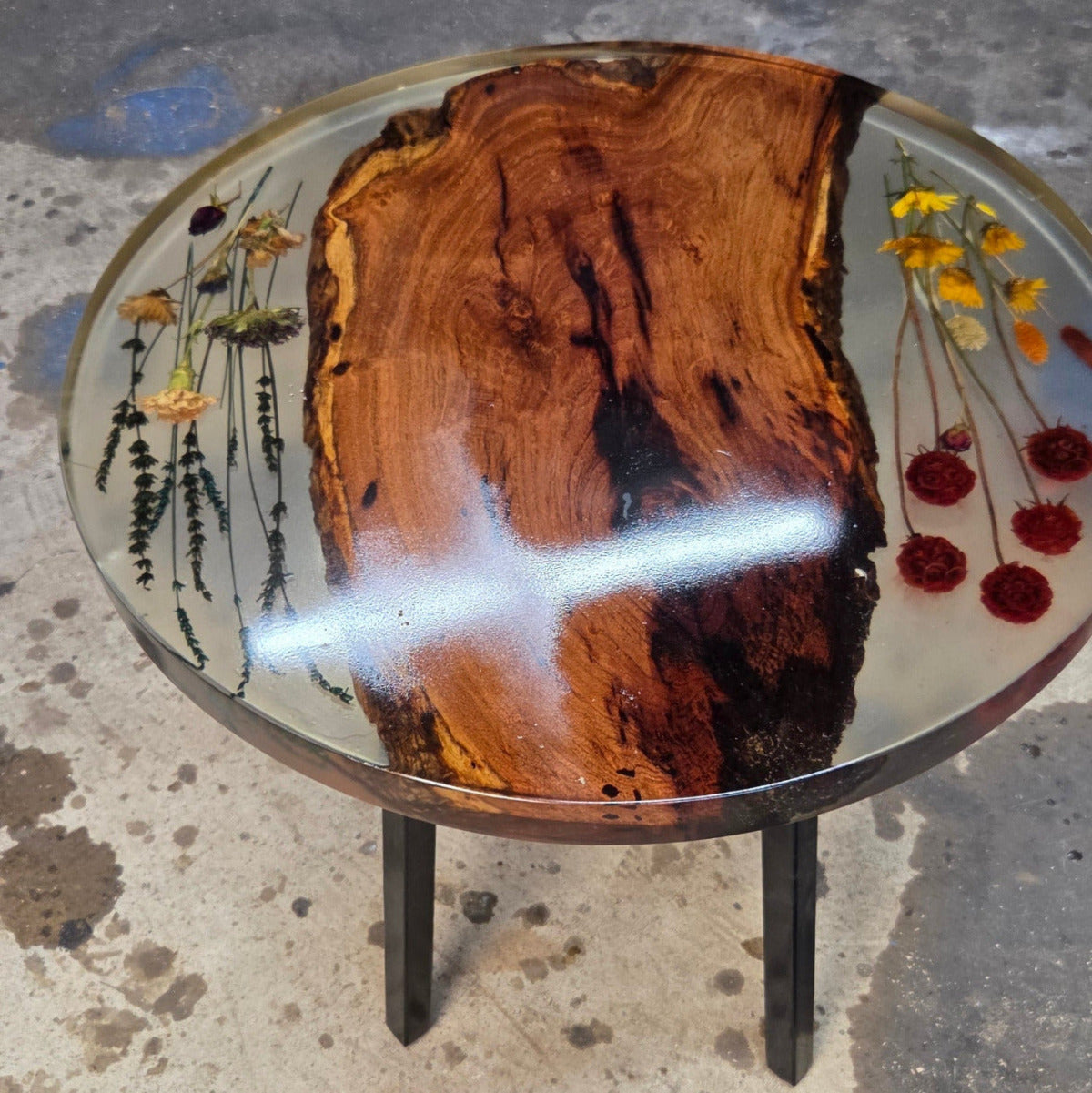 Epoxy End table with inlay-ed with Flowers and mesquite slab on black metal legs,