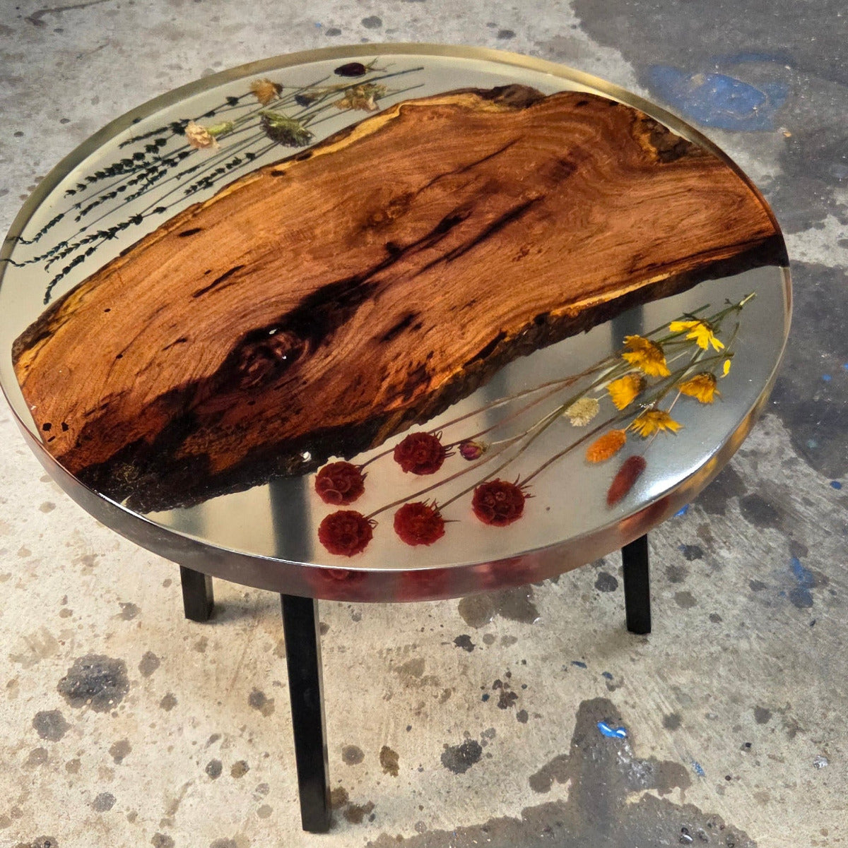 Epoxy End table with inlay-ed with Flowers and mesquite slab on black metal legs,