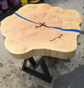 Cedar Elm End Table with Blue Epoxy Fill and black metal legs.