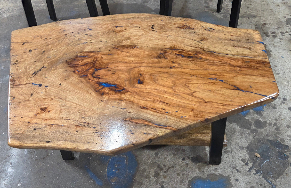 Live edge rustic Rectangular Pecan coffee table with lower shelf on black metal legs, blue epoxy inlay