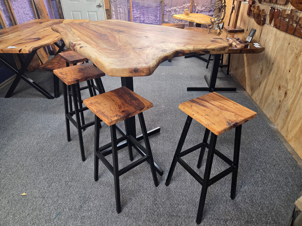Live edge Burl Pecan Breakfast table with black metal pedestal legs and four matching pecan bar stools