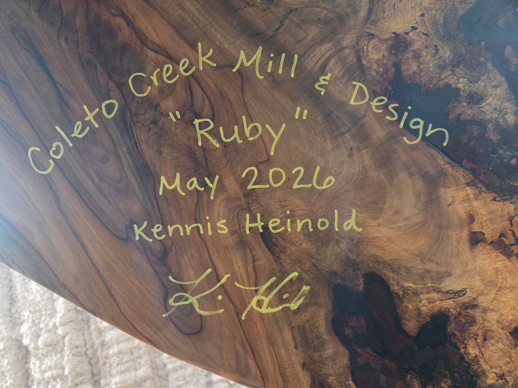 Live edge Burl Pecan Breakfast table with black metal pedestal legs and four matching pecan bar stools