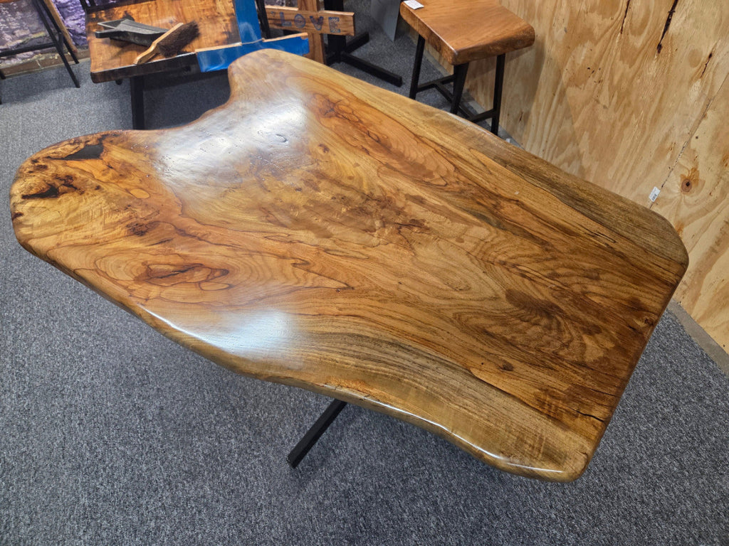 Live edge Burl Pecan Breakfast table with black metal pedestal legs