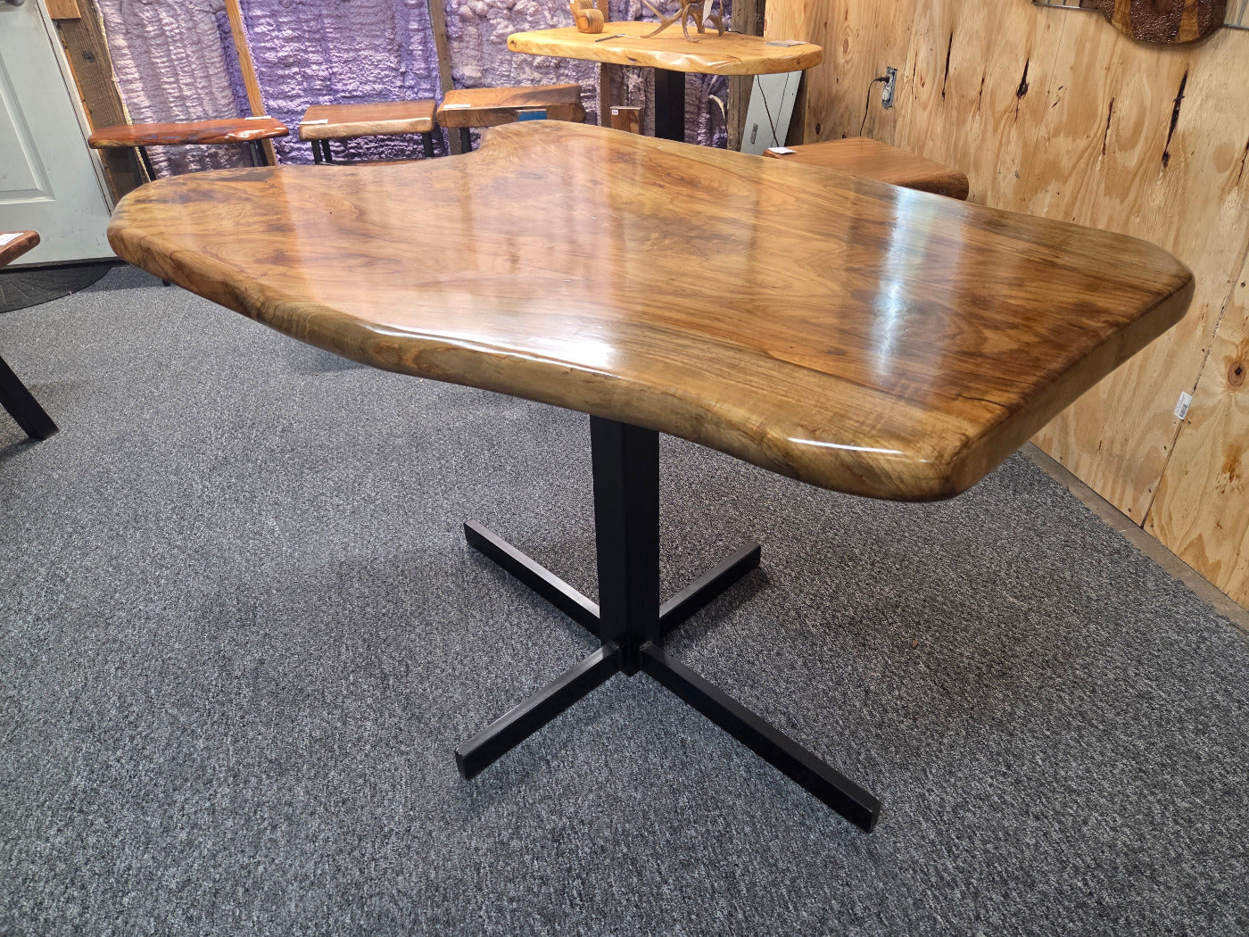 Live edge Burl Pecan Breakfast table with black metal pedestal legs