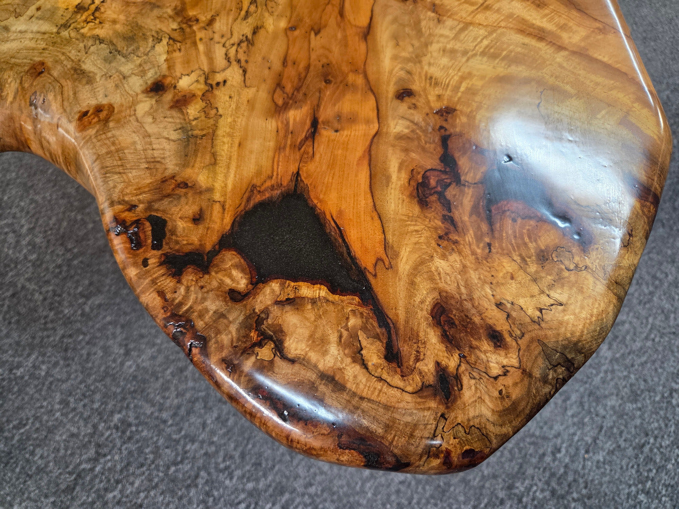 Live edge Burl Pecan Breakfast table with black metal pedestal legs