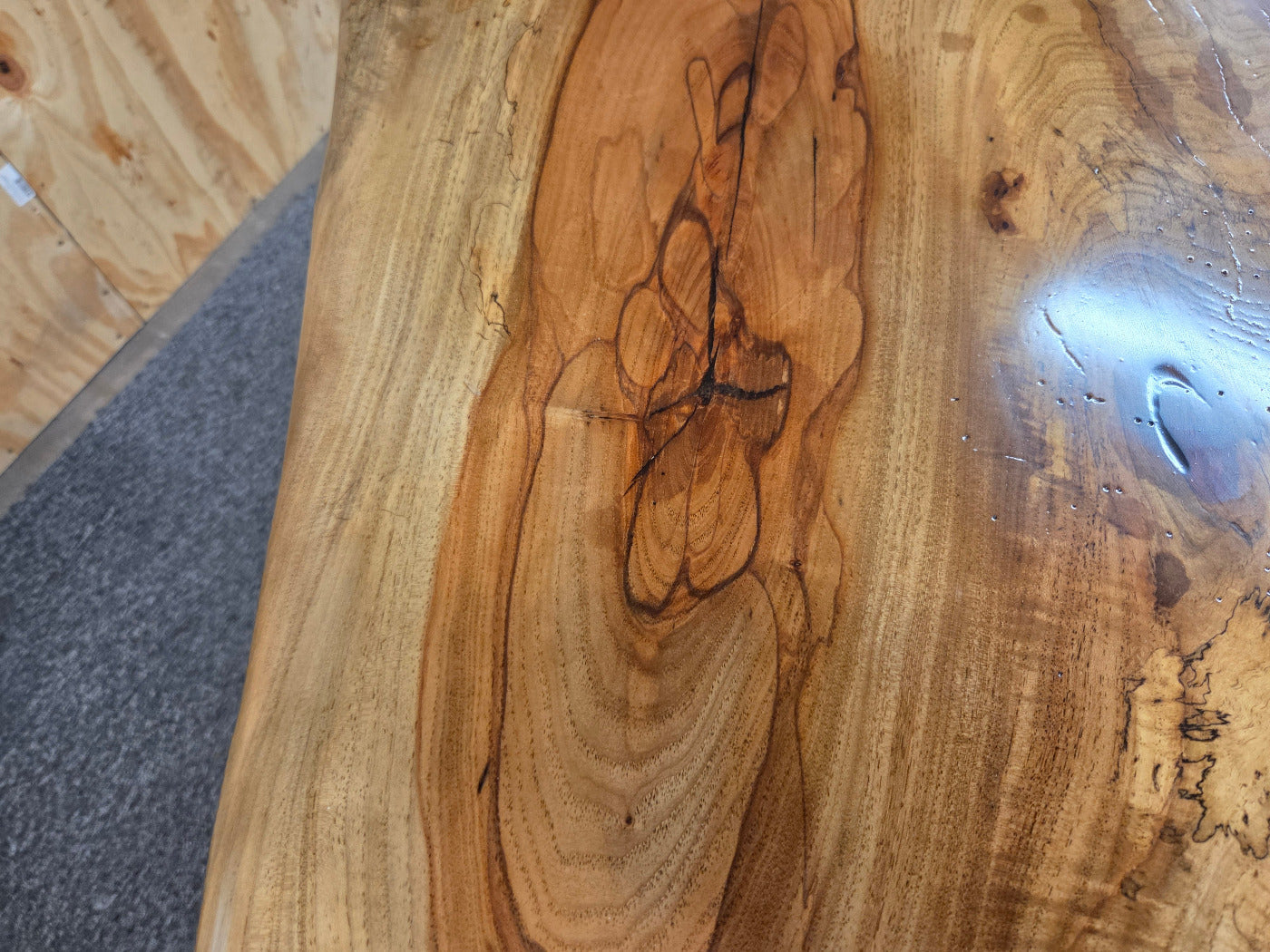 Live edge Burl Pecan Breakfast table with black metal pedestal legs