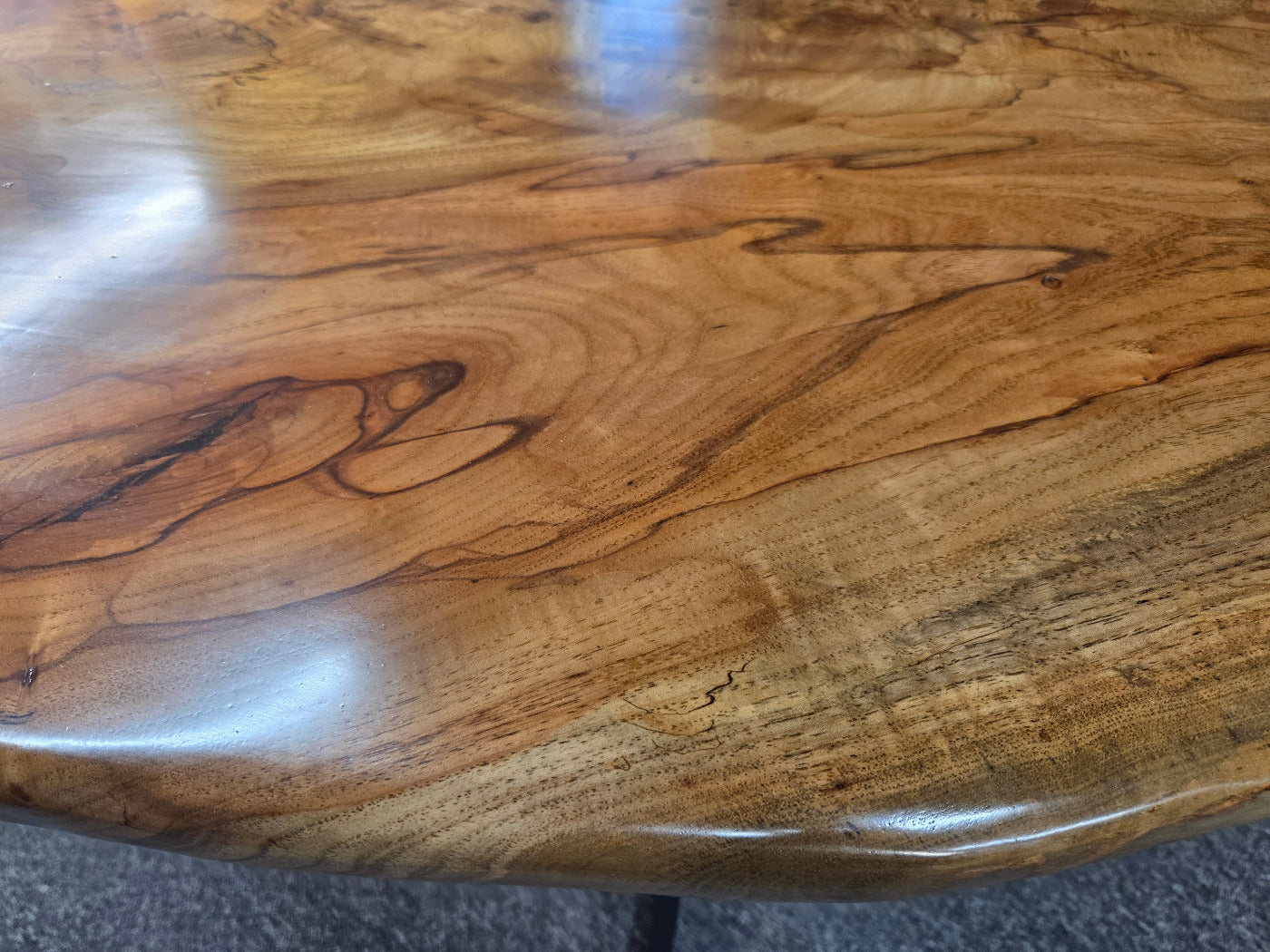 Live edge Burl Pecan Breakfast table with black metal pedestal legs
