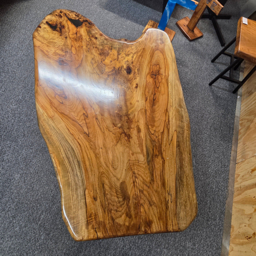 Live edge Burl Pecan Breakfast table with black metal pedestal legs