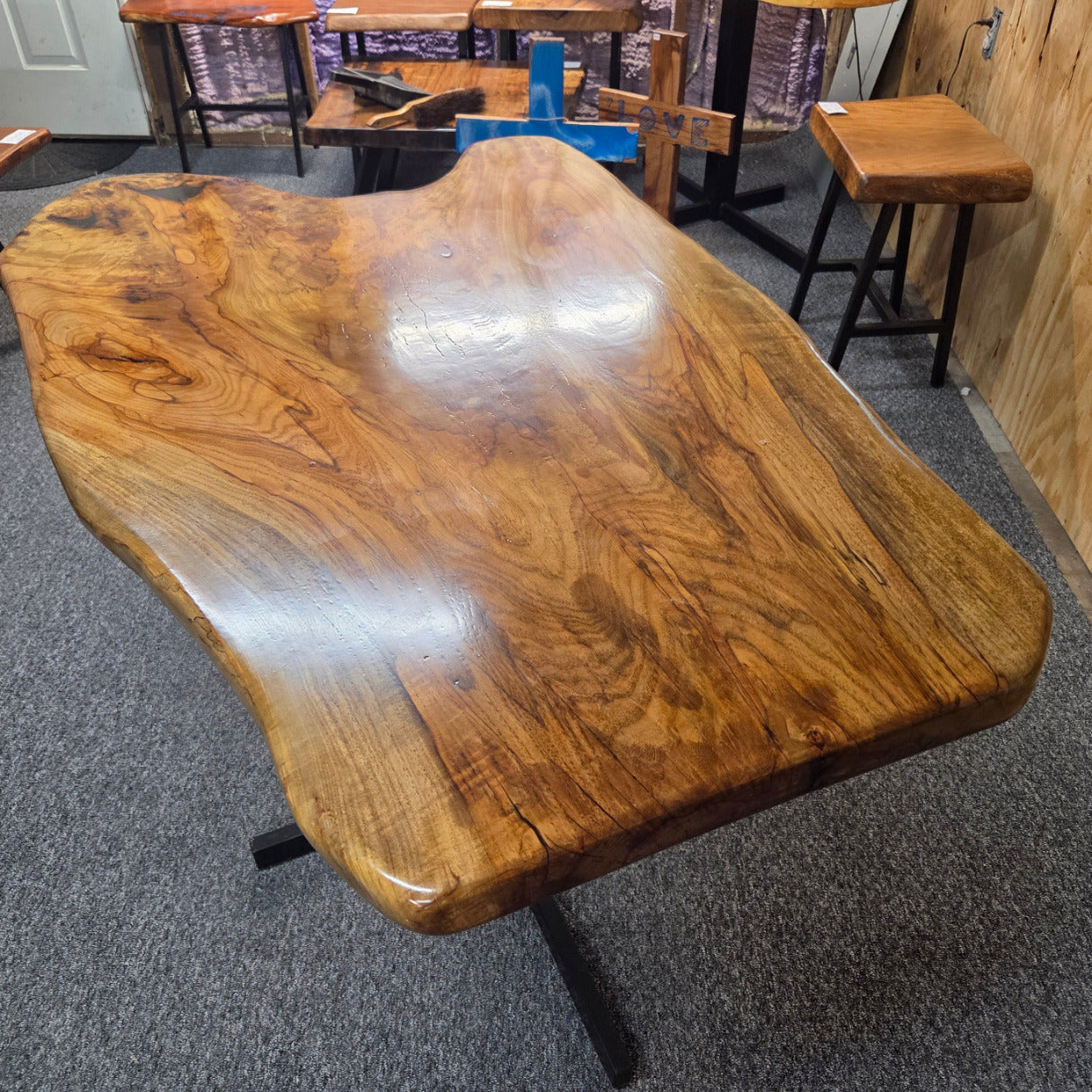 Live edge Burl Pecan Breakfast table with black metal pedestal legs