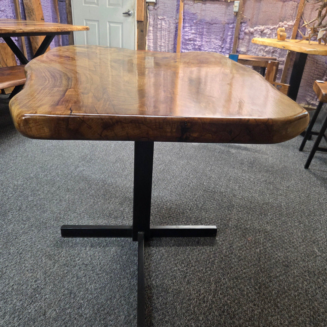Live edge Burl Pecan Breakfast table with black metal pedestal legs