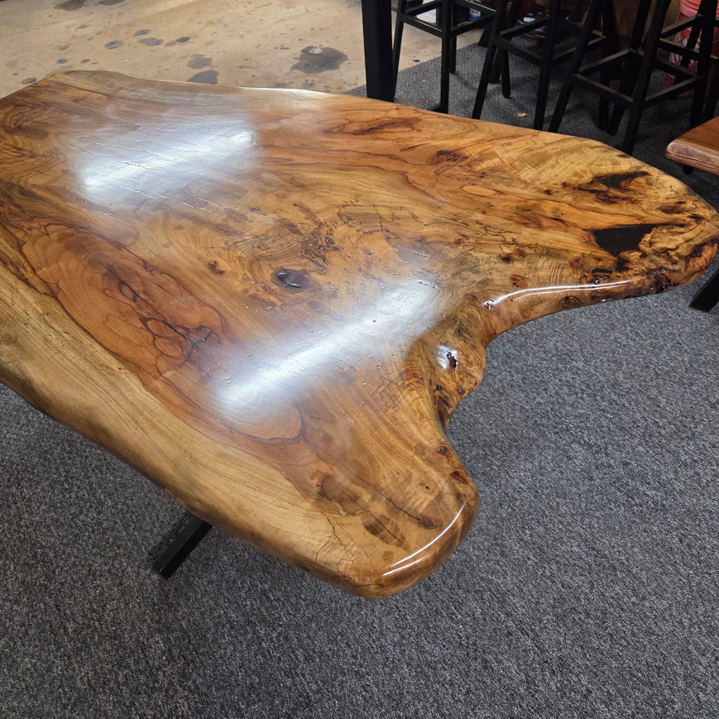 Live edge Burl Pecan Breakfast table with black metal pedestal legs