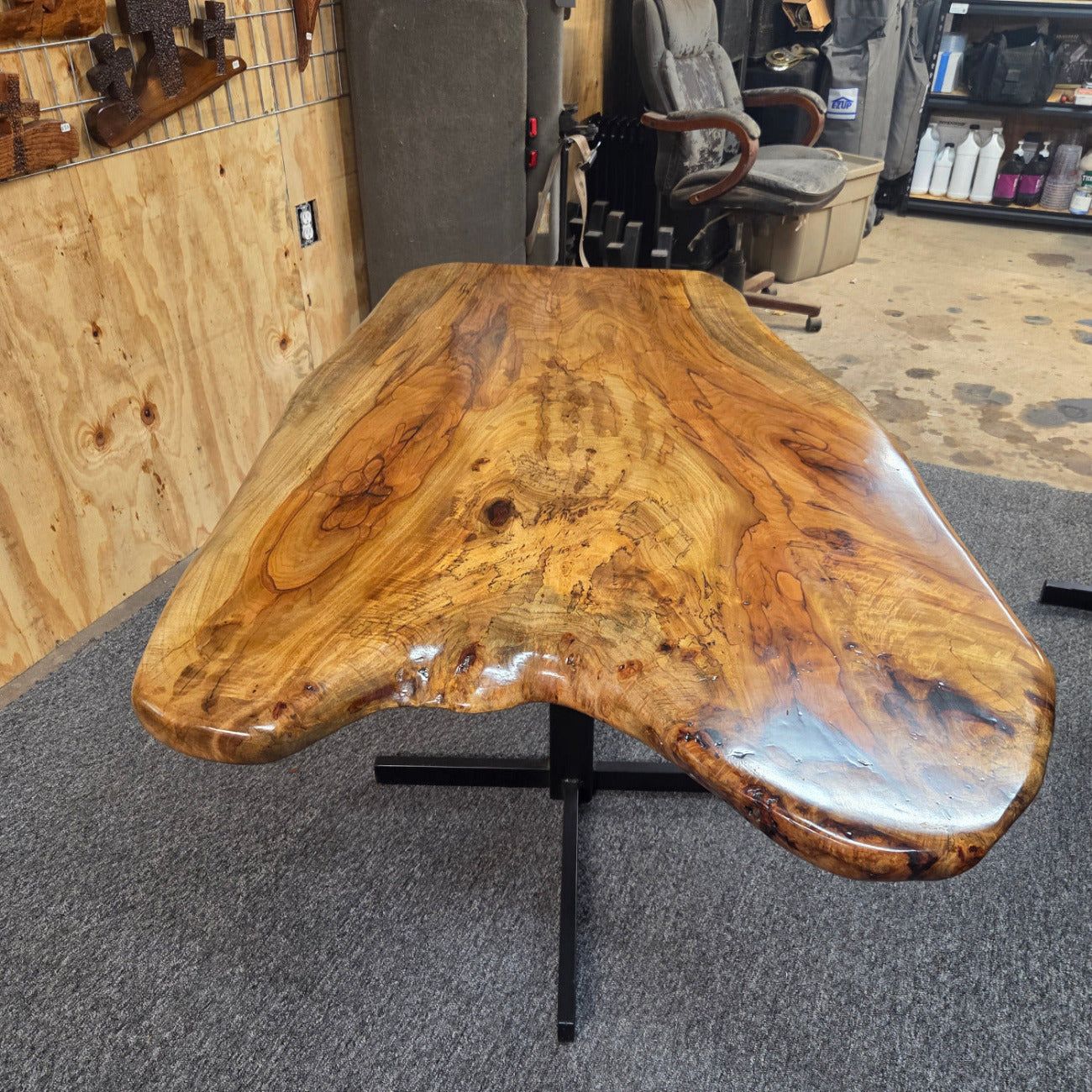 Live edge Burl Pecan Breakfast table with black metal pedestal legs