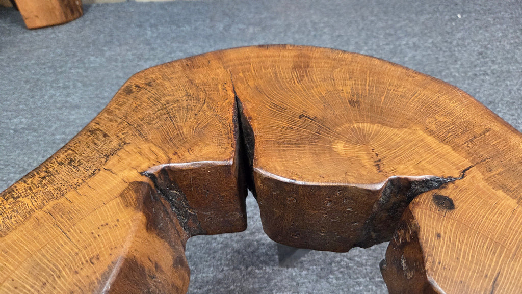 Large Live Oak Coffee Table with organic live edge shape, hole in the center section with black metal legs