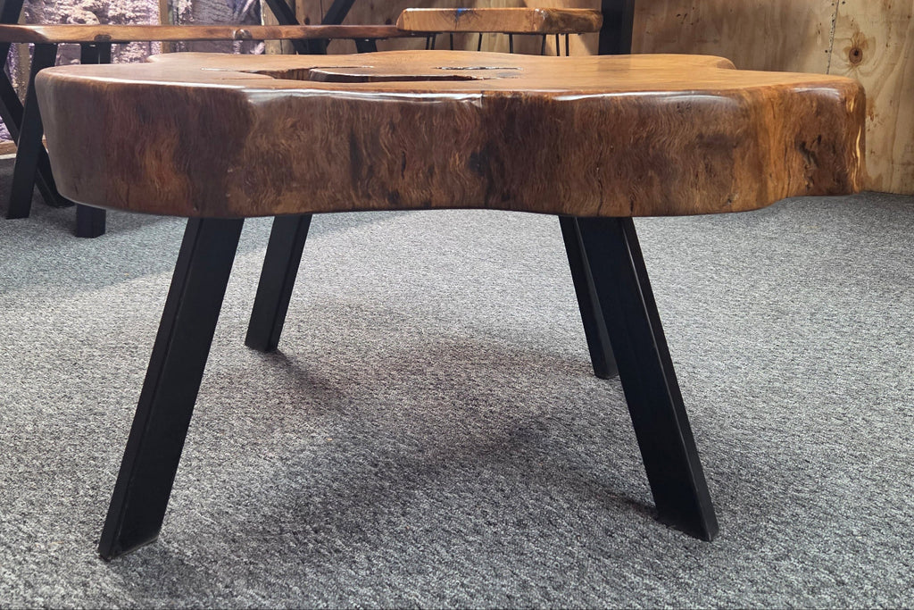 Large Live Oak Coffee Table with organic live edge shape, hole in the center section with black metal legs