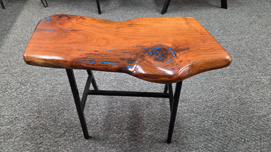 Live Edge mesquite end table with blue epoxy inlay on black metal square tubed legs