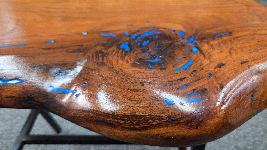 Live Edge mesquite end table with blue epoxy inlay on black metal square tubed legs