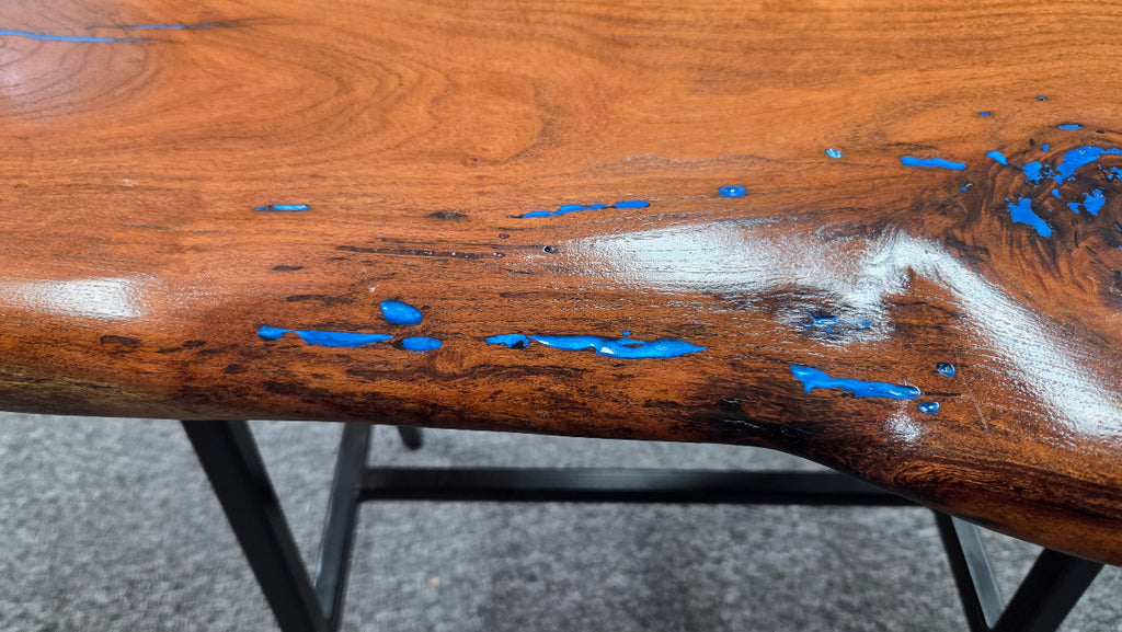 Live Edge mesquite end table with blue epoxy inlay on black metal square tubed legs