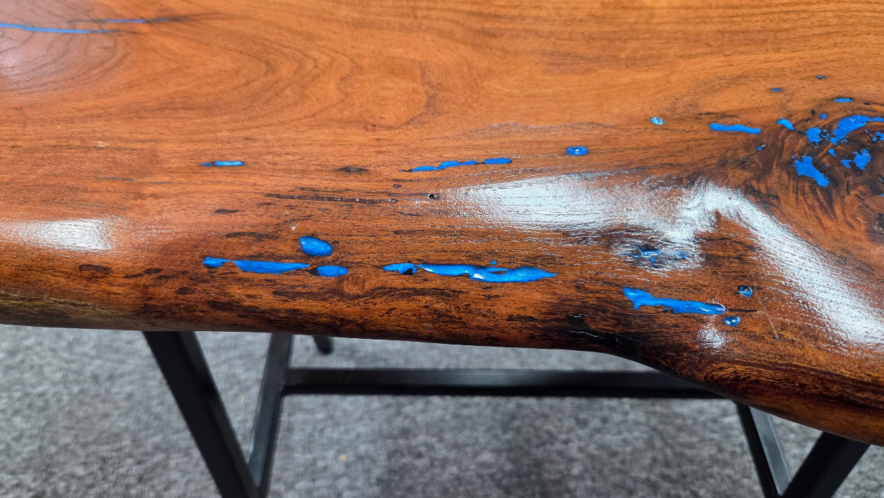 Live Edge mesquite end table with blue epoxy inlay on black metal square tubed legs