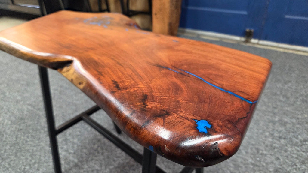 Live Edge mesquite end table with blue epoxy inlay on black metal square tubed legs