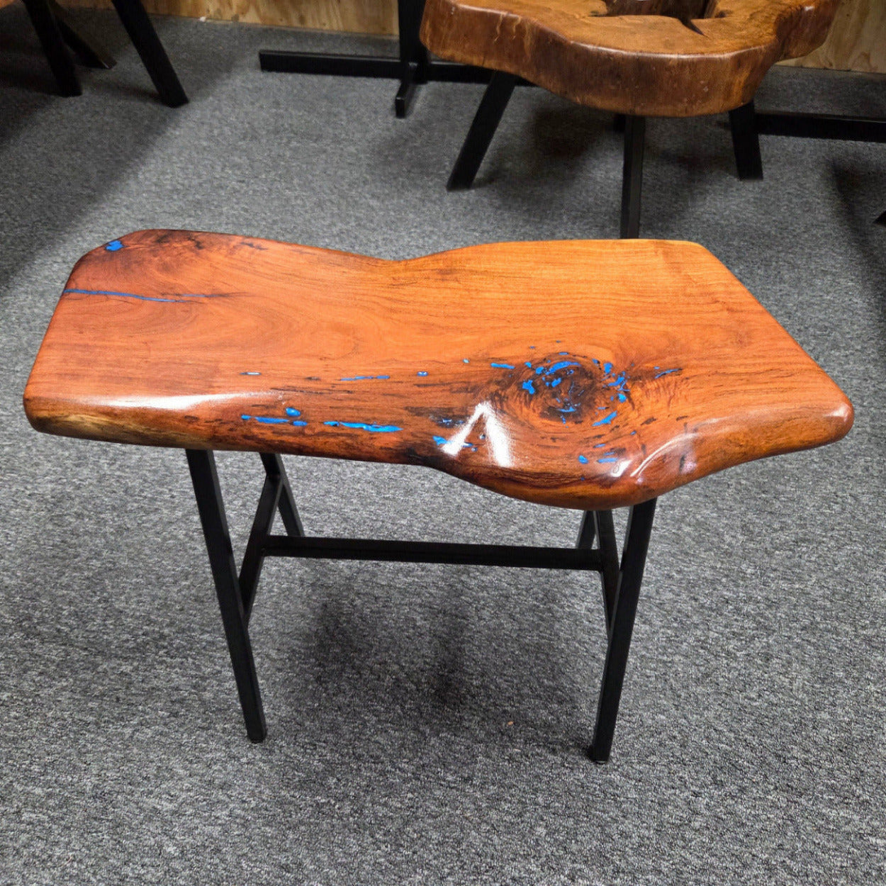 Live Edge mesquite end table with blue epoxy inlay on black metal square tubed legs