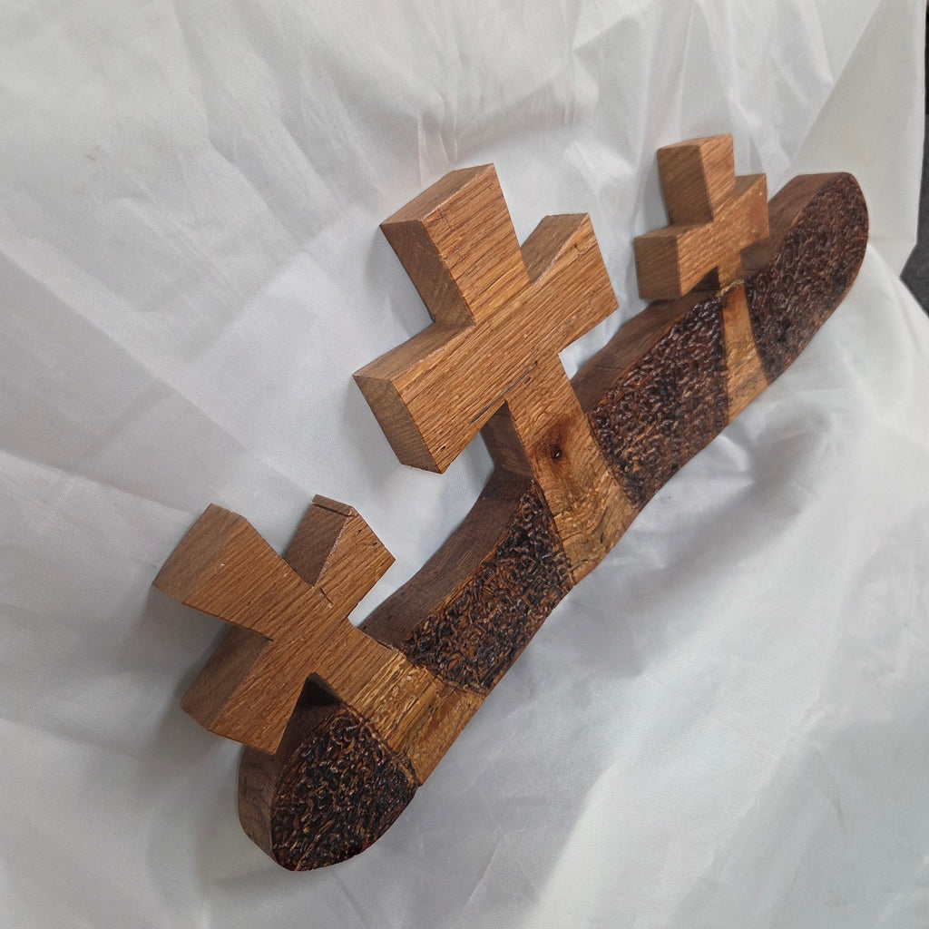 White Oak slab hand carved with three crosses cut out. Sho Sugi Bon burned
