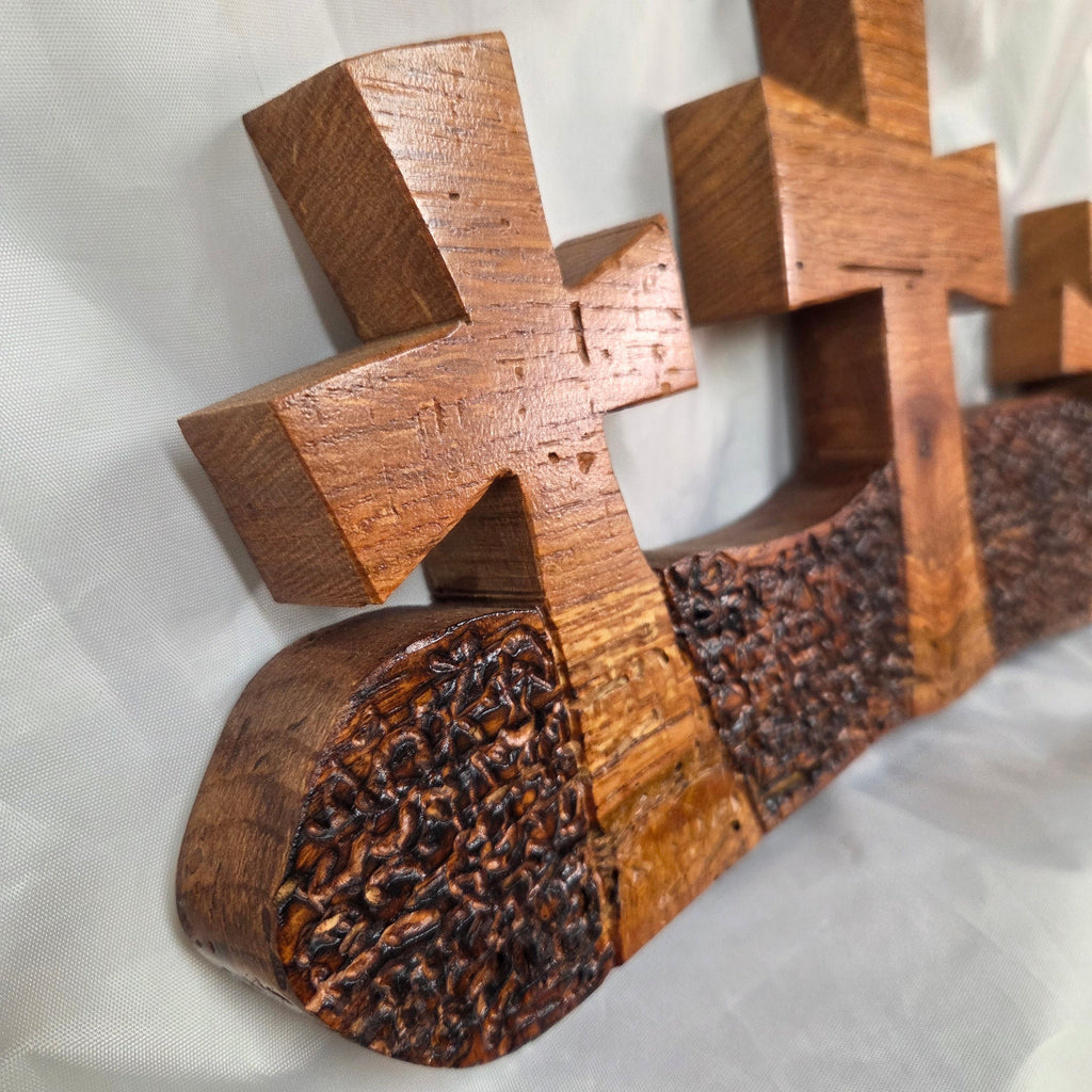 White Oak slab hand carved with three crosses cut out. Sho Sugi Bon burned