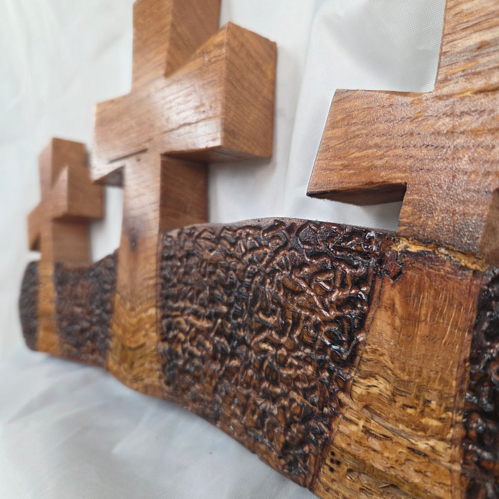White Oak slab hand carved with three crosses cut out. Sho Sugi Bon burned