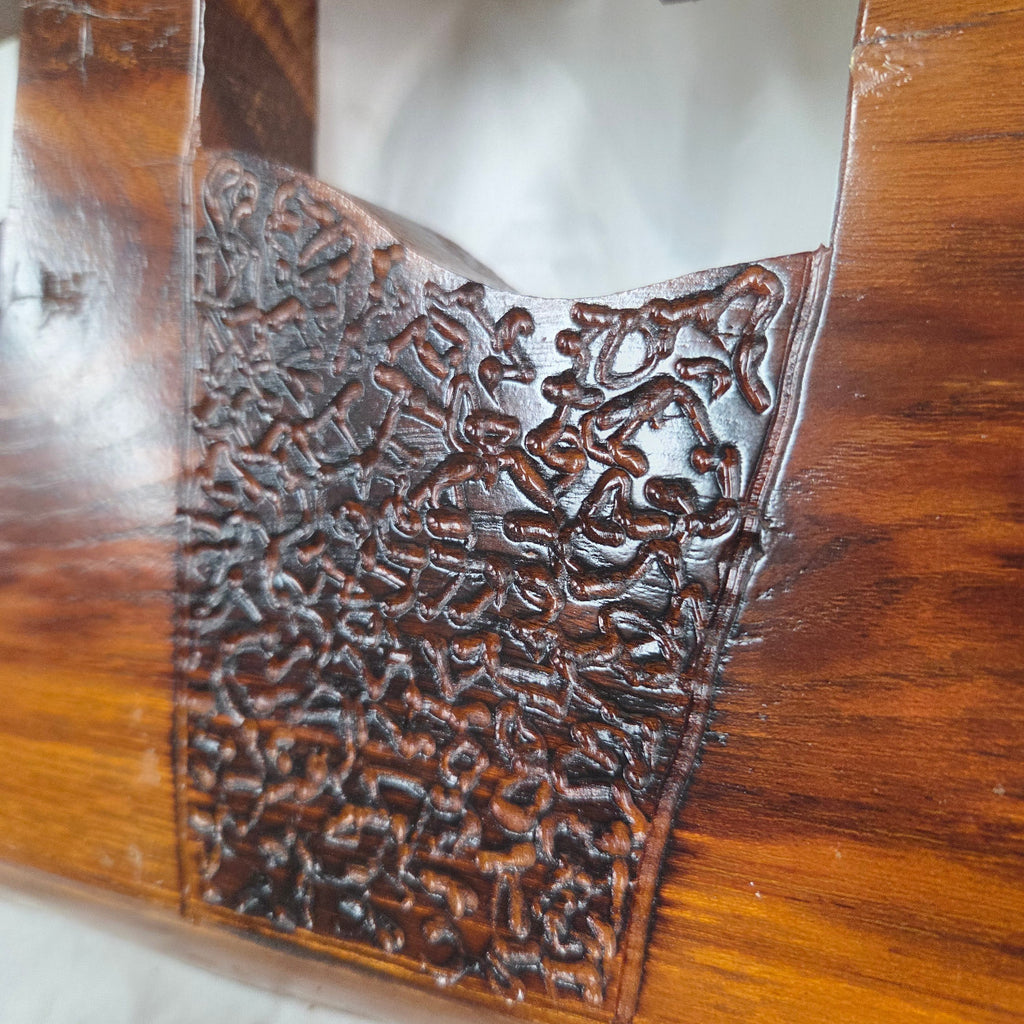 A Bois D'Arc decorative wall plaque featuring three stylized Christian crosses cut from a single slab, hand carved with burned finish sho sugi ban with natural grain 