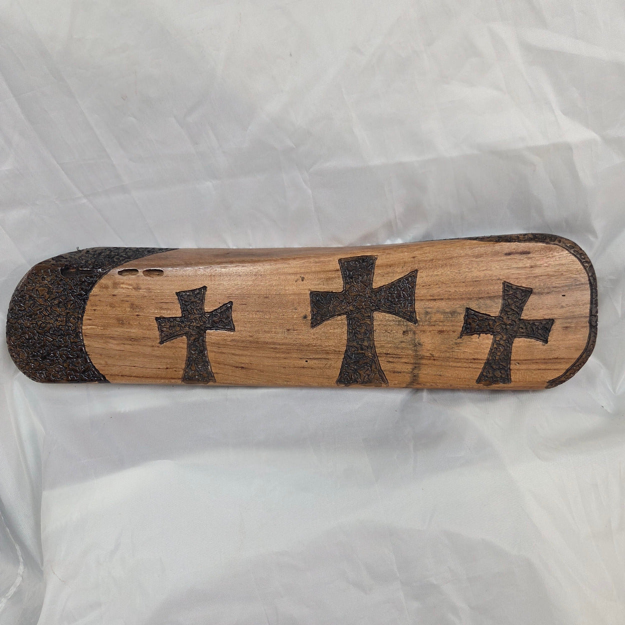 Pecan Wall sign with three hand carved crosses and carved sides. natural edges