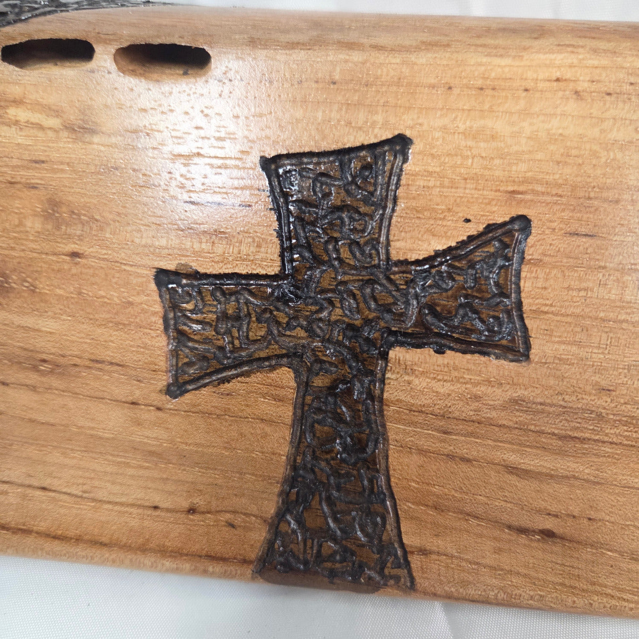 Pecan Wall sign with three hand carved crosses and carved sides. natural edges