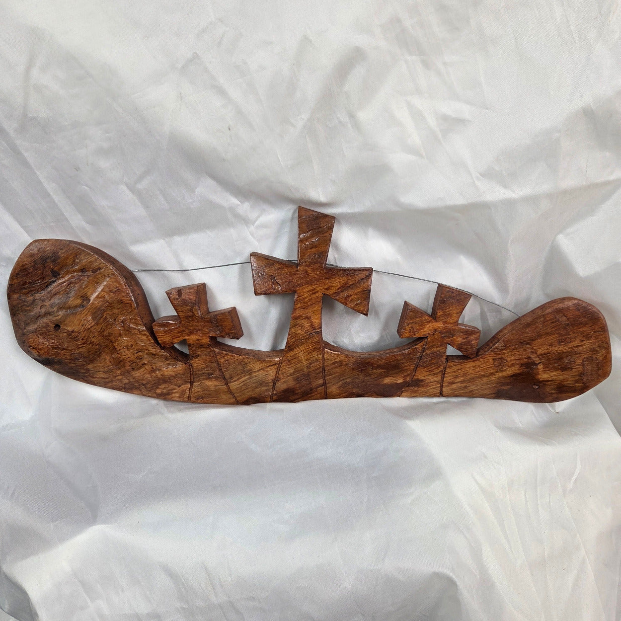 Three crosses landscape wall art hand cut from a single piece of Pecan, honey oak stained