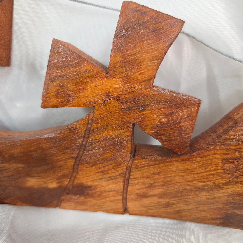 Three crosses landscape wall art hand cut from a single piece of Pecan, honey oak stained
