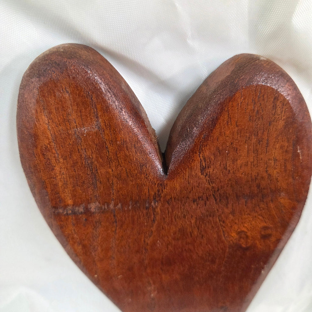heart-shaped mesquite wall art with a polished finish, showcasing natural wood grain