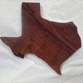 A carved mesquite wall plaque shaped like the state of Texas, with Blue epoxy fill and semi-gloss finish