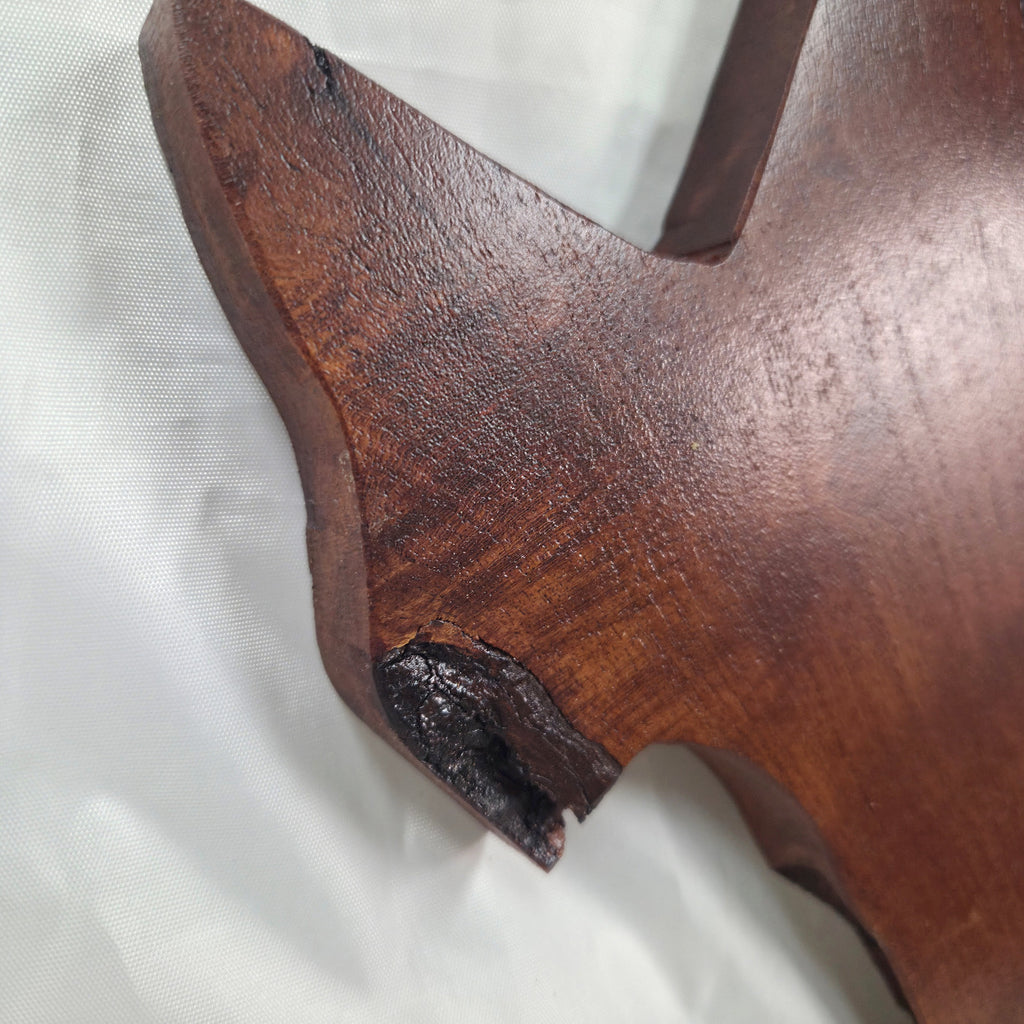close up A carved mesquite wall plaque shaped like the state of Texas, with Blue epoxy fill and semi-gloss finish