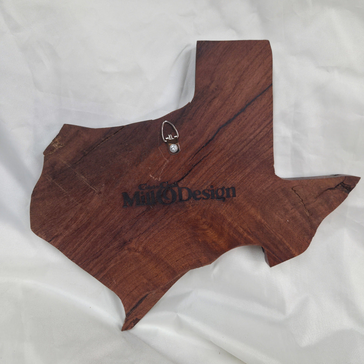 back view A carved mesquite wall plaque shaped like the state of Texas, with Blue epoxy fill and semi-gloss finish