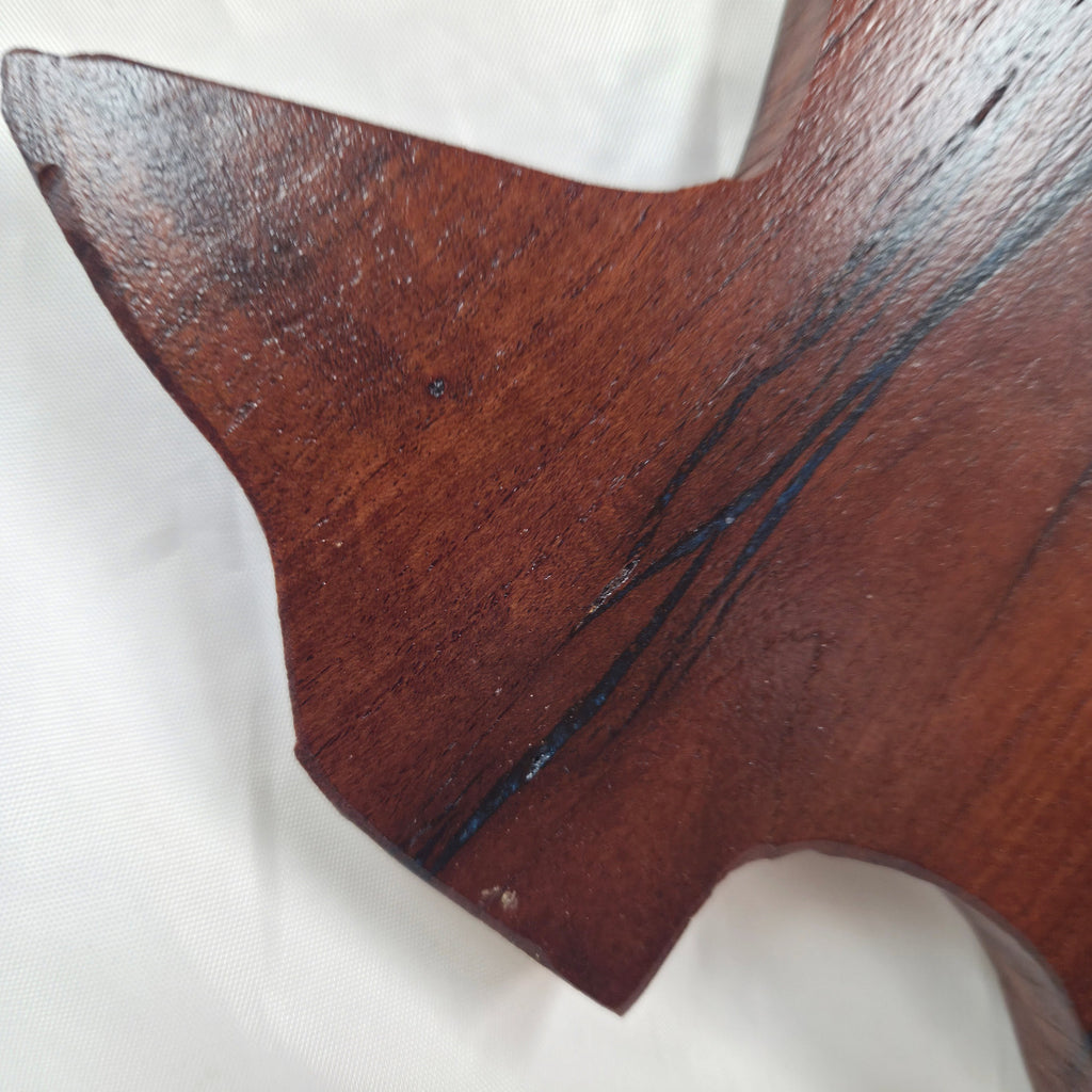 close up A carved mesquite wall plaque shaped like the state of Texas, with Blue epoxy fill and semi-gloss finish
